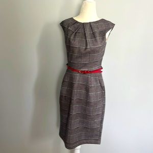 Beautiful dress in like new condition, with belt.